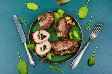Photo for Beef rolls stuffed with mushrooms and herbs. Roasted meat, meatloaf - Royalty Free Image