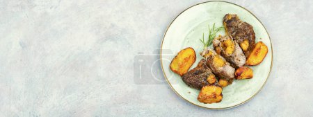 Photo for Grilled beef meat steak with peach in fruit marinade. Barbecue. Copy space. - Royalty Free Image