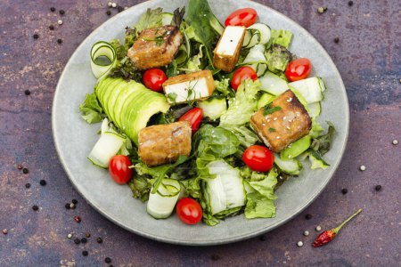 Photo for Unusual salad with fried cheese, vegetables and herbs. Healthy vegetarian salad - Royalty Free Image