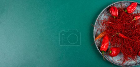 Photo for Spicy seasoning, spice, cut from red pepper. Spices for cooking, copy space. - Royalty Free Image