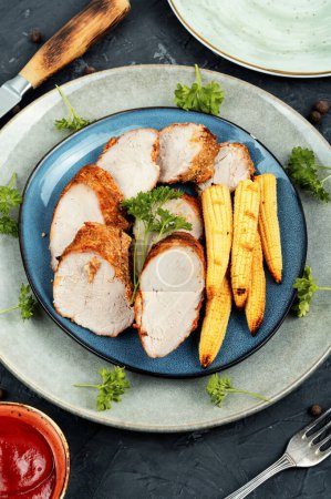 Photo for Barbecue pork filet medaillons with grilled baked corn. - Royalty Free Image