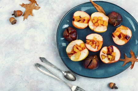 Photo for Tasty baked autumn apples and figs, fruit dessert. Menu recipe place. - Royalty Free Image