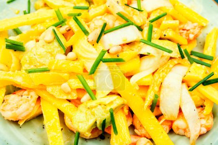 Photo for Salad of mango, avocado, shrimp and pine nuts. Healthy Asian salad, close up. - Royalty Free Image