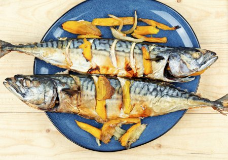 Photo for Yummy mackerel fish roasted with mango. Scomber roast. - Royalty Free Image
