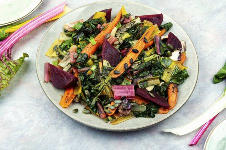 Photo for Warm salad,healthy sauteed swiss chard with vegetables. Healthy nutrition - Royalty Free Image