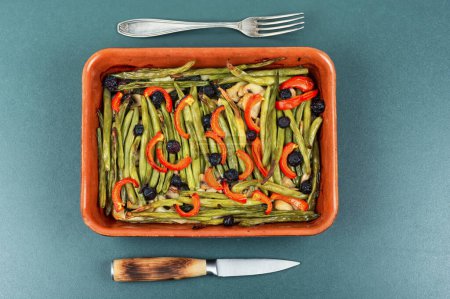 Photo for Tart with vegetables in baking dish. Vegetarian pie with green or bush beans and peppers. Top view. - Royalty Free Image