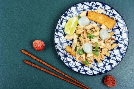 Photo for Healthy lunch menu. Delicious salad with lychee, lime and chicken meat. Space for text - Royalty Free Image