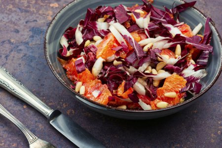 Photo for Appetizing salad with red radicchio and orange. - Royalty Free Image