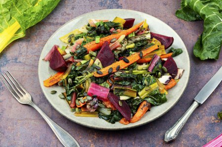 Photo for Diet bright food - stewed chard, beets and carrots. Vegetarian healthy food concept - Royalty Free Image