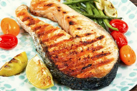 Photo for Grilled salmon steak with grilled vegetables, Roasted fish. Ketogenic lunch. - Royalty Free Image