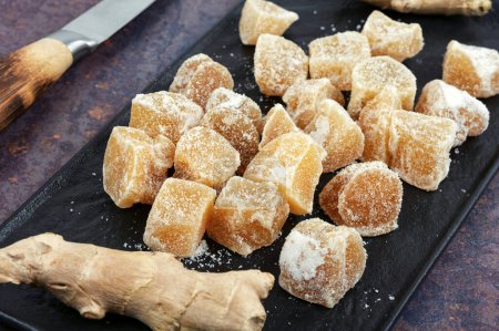 Photo for Sugared candied ginger ginger dessert. Healthy sweets. - Royalty Free Image