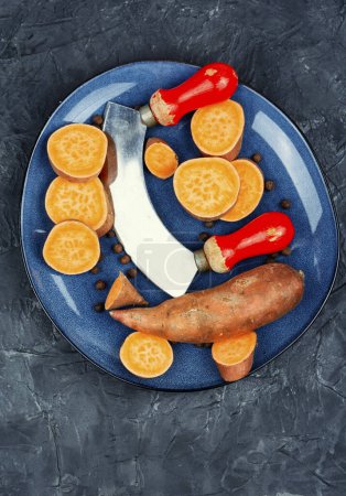 Photo for Sliced fresh sweet potatoes for cooking. Flat lay. - Royalty Free Image