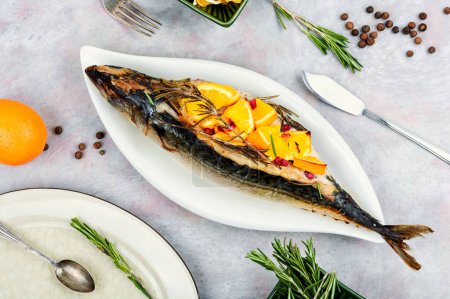 Photo for Tasty mackerel fish baked with oranges and rosemary. Top view, flat lay. - Royalty Free Image