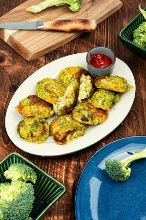 Photo for Vegetable vegan broccoli cutlets, vegetarian food on a wooden table. - Royalty Free Image