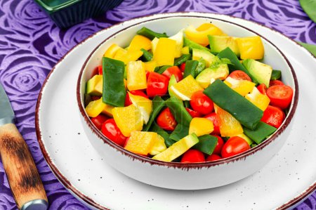 Photo for Fresh vegetable salad with bell pepper, tomato, avocado and runner beans or green bean. - Royalty Free Image
