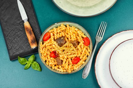 Photo for Delicious boiled and fried pasta with beef and vegetables. - Royalty Free Image