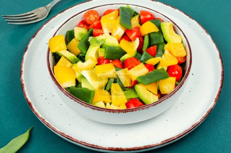 Photo for Homemade vegetable salad with bell pepper, tomato, avocado and runner beans or green bean. - Royalty Free Image