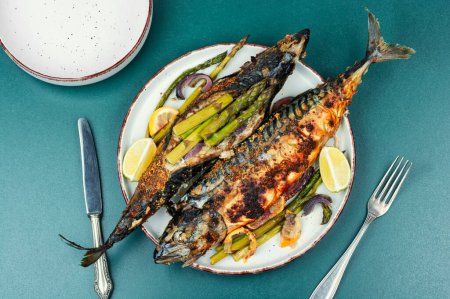 Photo for Delicious roasted of mackerel fish with green asparagus. - Royalty Free Image