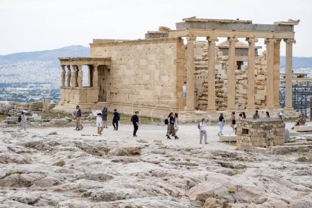 Photo for Athens, Greece - May 15, 2023: Tourists Scattered in Front of the Temple of Athena Nike on the Acropolis in an Afternoon - Royalty Free Image