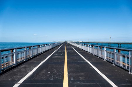 View of the Empty Old Seven Mile Bridge Framed by the Blue Ocean and Sky
