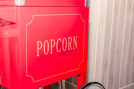 popcorn text on automatic popcorn machine with space to add text