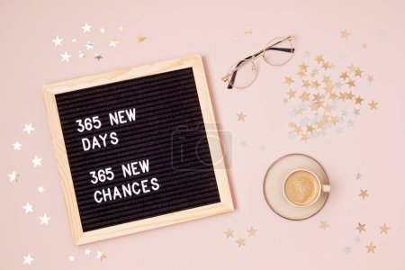 Photo for 365 new days, 365 new chances. Letter board with motivational quote on pink background. New year resolutions and goal setting, self improvement and development concept. - Royalty Free Image