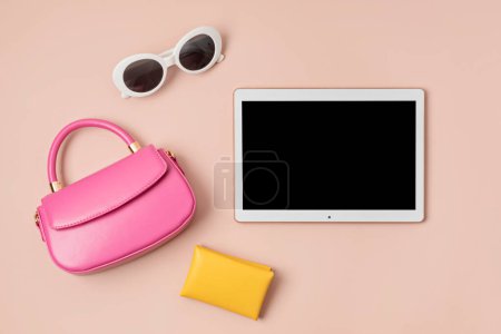 Photo for Flat lay with woman fashion accessories in pastel colors and tablet mockup. Fashion blog, summer urban style, shopping and trends concept - Royalty Free Image