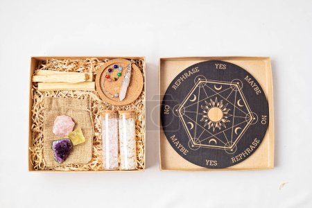 Photo for DIY gift box for wicca, witchcraft lovers. Crystals, witch accessories, pendulum board for divination and fortune telling. Mystic, esoteric, occult  present idea - Royalty Free Image