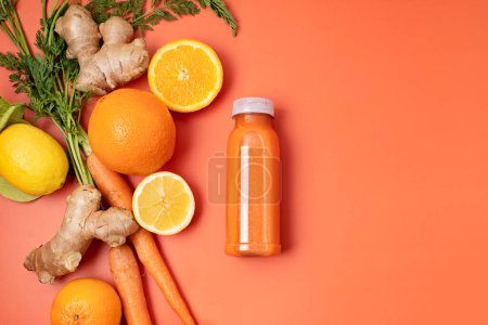 Photo for Healthy fresh orange, carrot and ginger smoothie with assorted ingredients. Superfood detox and diet concept. Top view, flat lay - Royalty Free Image