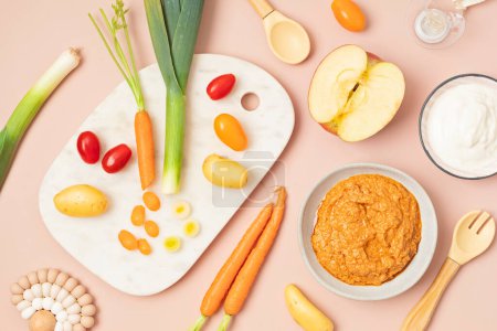 Photo for Baby puree made of fresh vegetables and fruits. First baby solid food recipe idea. Top view,  flat lay - Royalty Free Image