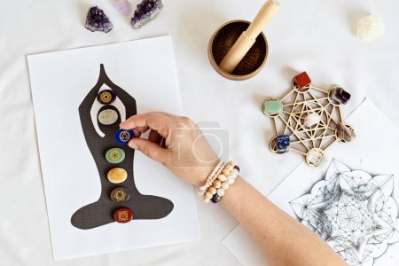 Healing chakra crystal grid therapy. Rituals with gemstones for wellness, healing, meditation, destress, relaxation, mental health, spiritual practices. Energetical power concept