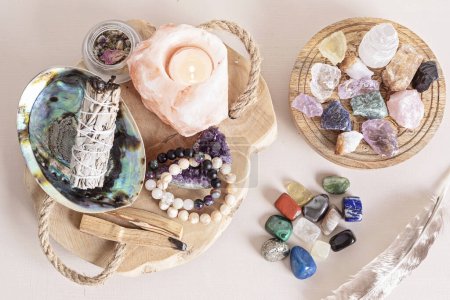 Photo for Smudge kit with white sage, palo santo, himalayan salt candle holder. Natural elements for wellbeing, elements for cleansing environment from negative energy, adding positive vibes. Spiritual practices - Royalty Free Image
