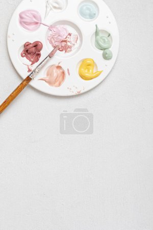 Photo for Artist painting palette with brushes. Craft hobby background. Recomforting, destressing hobby, art therapy - Royalty Free Image