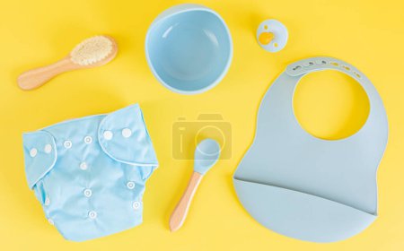 Photo for Flat lay with reusable cloth baby diaper and accessories. Eco friendly nappy on pink pastel background. Sustainable lifestyle, zero - Royalty Free Image