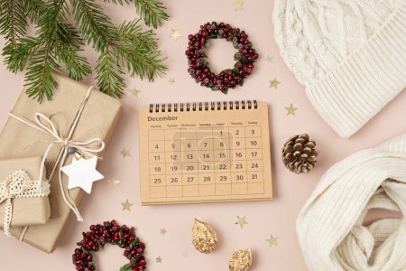 Photo for Christmas background with calendar for December and xmas decoration. Winter holidays celebration concept. Flat lay, top view - Royalty Free Image