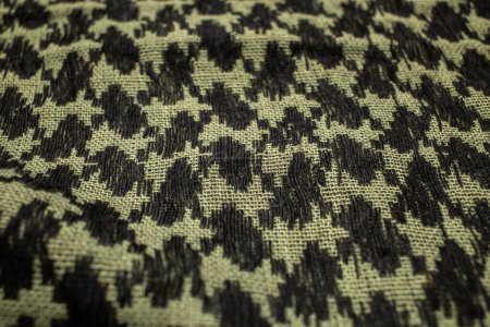 Foto de Bufanda Keffieh. La textura de la bufanda árabe simbólica tradicional de algodón. Fondo caqui. - Imagen libre de derechos