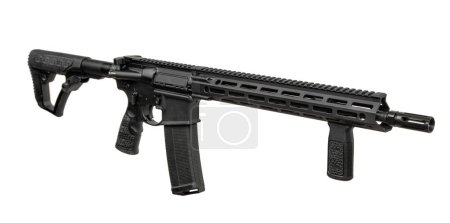 A modern automatic carbine without sights and with an additional handle. Isolate on a white background.