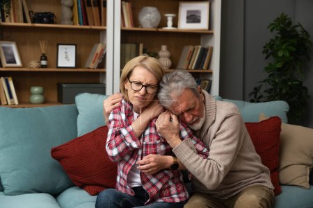 Photo for Senior couple husband and wife man and woman, hugs seriously ill woman for support feels her pain regrets her health problem Supporting and loving the chosen one of his life he suffers from depression - Royalty Free Image
