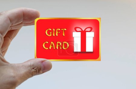 Photo for Hand holding a gift card - Royalty Free Image