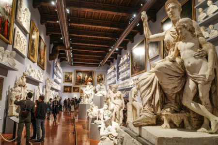 Photo for Florence, Italy - 20 Nov, 2022: Religious artwork and marble sculptures in the Academy Gallery - Royalty Free Image