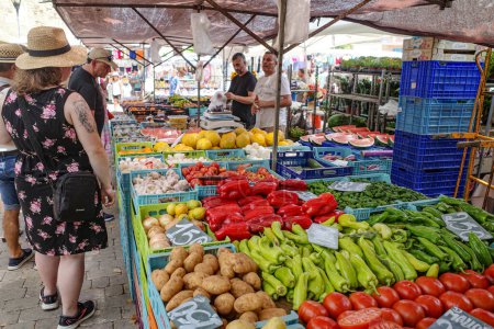 Photo for Alcudia, Spain - 9 July, 2023: Market day in the Old town of Alcudia, Mallorca - Royalty Free Image