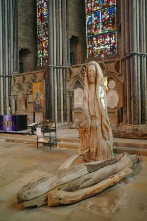Photo for Durham, UK - July 12, 2023: The Pieta, a wooden sculpture of the Christ and mother Mary. Durham Cathedral, England - Royalty Free Image