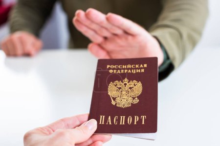Photo for Image of Russian internal passport. Concept of renunciation (relinquishment) of Russian citizenship by reason of military action in Ukraine and migration of citizens from Russia to other countries. - Royalty Free Image