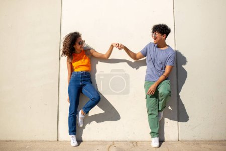 Photo for Full body portrait of happy young man and woman together - Royalty Free Image
