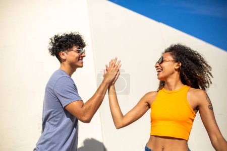Photo for Portrait of smiling young man and woman together, friends - Royalty Free Image