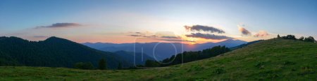 Photo for Panorama of svydovets ridge at sunset. beautiful summer landscape of carpathian mountains. grassy meadows and forest on the hill. clouds on the sky - Royalty Free Image