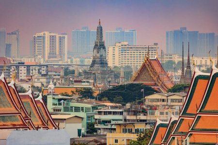 View on the Bangkok old city and the Wat Arun temple with modern city.