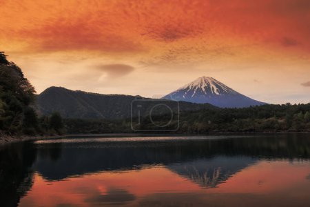 Photo for Mount Fuji with skyline reflection and twilight sky before sunrise, Yamanashi, Japan. Famous travel destination and holiday vacation maker. - Royalty Free Image