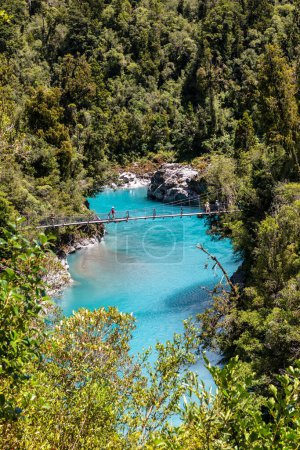 Hokitika Gorge a major tourist destination some 33 kilometres from Hokitika, New Zealand .The turquoise colour is due to glacial flour, in the water. The silt is so fine it remains in suspension in the water.