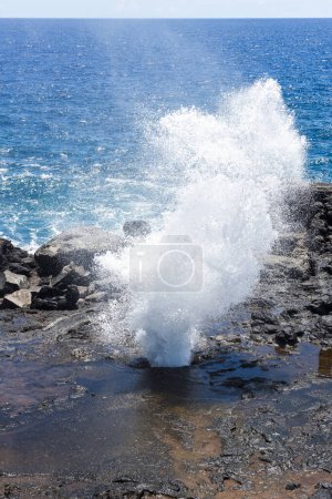 Photo for Wave blowing out of Nakalele hole - Royalty Free Image